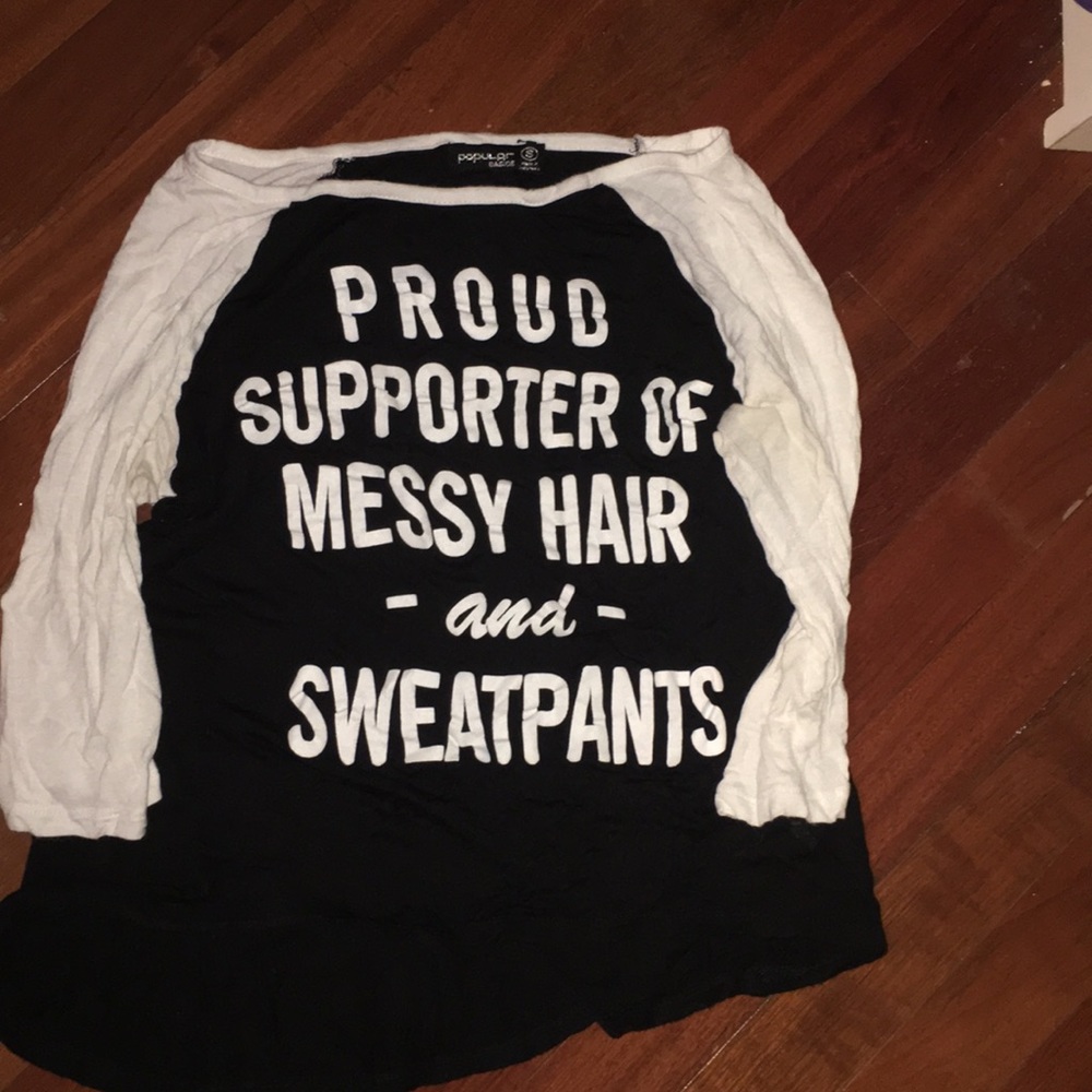 Black and white baseball tee styled shirt.